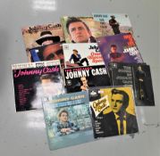 A lot of fifteen Johnny cash albums, including some early pressings.