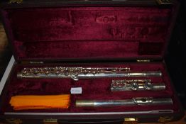 A Buffet Crampon flute , stamped made in England, BC6020, serial number 771283 (cooper scale), in
