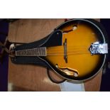 A Chord mandolin, sunburst with padded gig bag