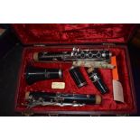 A 'Graduate' clarinet, made for Ruddal, Carte & Co , in original burgundy case, with plush lining