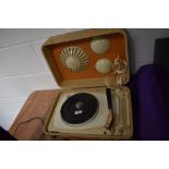 An unusual portable record player and speaker set by Radialva in cream and orange case
