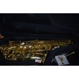 An Arnold and Sons alto saxophone, model ASA-110Y