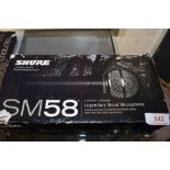 A Shure SM58-LCE microphone, tested working,in original box and case, could do with new grille bit