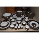 An assortment of Hornsea pottery contrast plates,cups,tureens, bowls and plates.around thirty