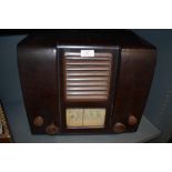 A brown early plastic Defiant radio, model M.S.H 546.