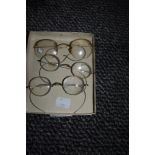Three pairs of vintage spectacles,two having silver tone frames and one pair gold tone.