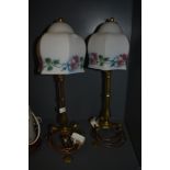 A pair of Pullman railway coach lamps both unmarked but having fastening hole to foot