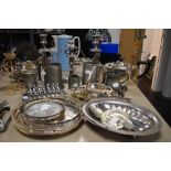 A mix of plated wares, pewter and similar amongst the lot there are candlestick holders, bowls,