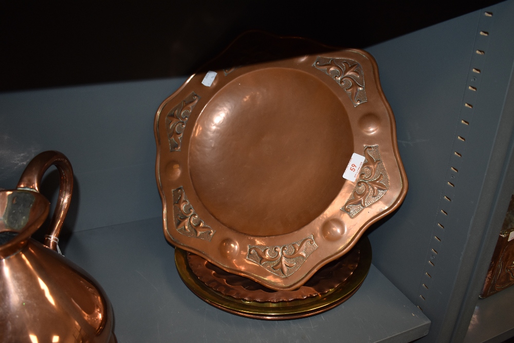 A selection of copper and brass plate including hand worked fruit bowl