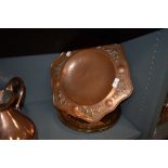 A selection of copper and brass plate including hand worked fruit bowl
