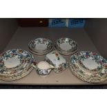 A collection of Royal Cauldon 'Victoria' plates and bowls, also a jug and cheese dish, around thirty