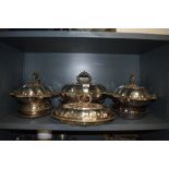 A selection of silver plated lidded serving dishes and tureen some marked TF
