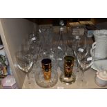 A mixed lot of glass including wine glasses, cut glass ash tray, vases and decanter.