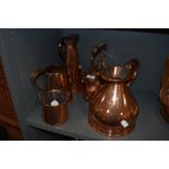 A selection of copper vessels including Joseph Sankey jug