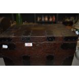 A antique oak chest having handles and bracket detailing and brass plaque to lid, key included.