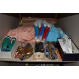 A mixed lot of vintage and retro items including shoes,fabric and jewellery.