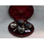 A cased set of four Victorian silver salts of bowl form having gadrooned decoration, London 1896/