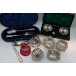 A selection of HM silver including nail buffer, cased pair of salts, cased christening cutlery