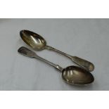 A pair of Scottish Victorian silver table spoons of fiddle back form bearing monogram H to