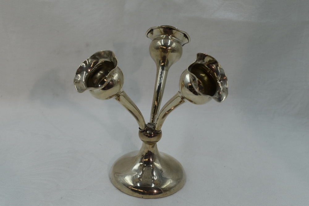 A small silver table epergne having three tulip shaped stem vases to a weighted base, Birmingham