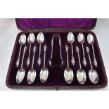 A cased set of twelve Victorian Apostle teaspoons with matching sugar nips, all having twist stems