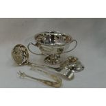 A small selection of HM silver including a sugar bowl having facetted decoration, loop handles amd