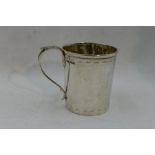 A silver christening mug having bright cut decoration and inscribed Bernard 1922, Sheffield 1919,