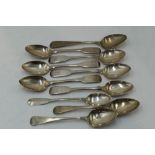 A set of six Georgian silver teaspoons of fiddle back form bearing monogram R to terminals,