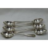 Six Edwardian silver dessert spoons of plain form bearing monogram G to terminals, Chester 1906,