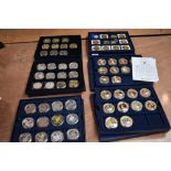 A collection of mainly Crown Size Coins in 6 trays, some maybe Silver, no certificates