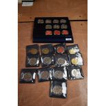 A collection of Channel Islands 5 Pound Coins in boxes and loose, 23 coins in total