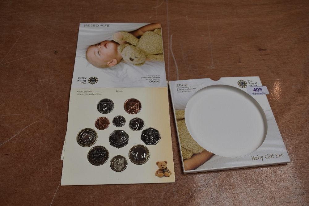 A 2009 United Kingdom Brilliant Uncirculated Coin Collection, Baby Gift Set, includes Kew Garden 50p