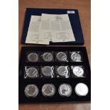 A collection of 12 GB 1oz Fine Silver Britannia 2 Pound Coins in tray, 2013 x4, 2014 x4 and 2015 x4