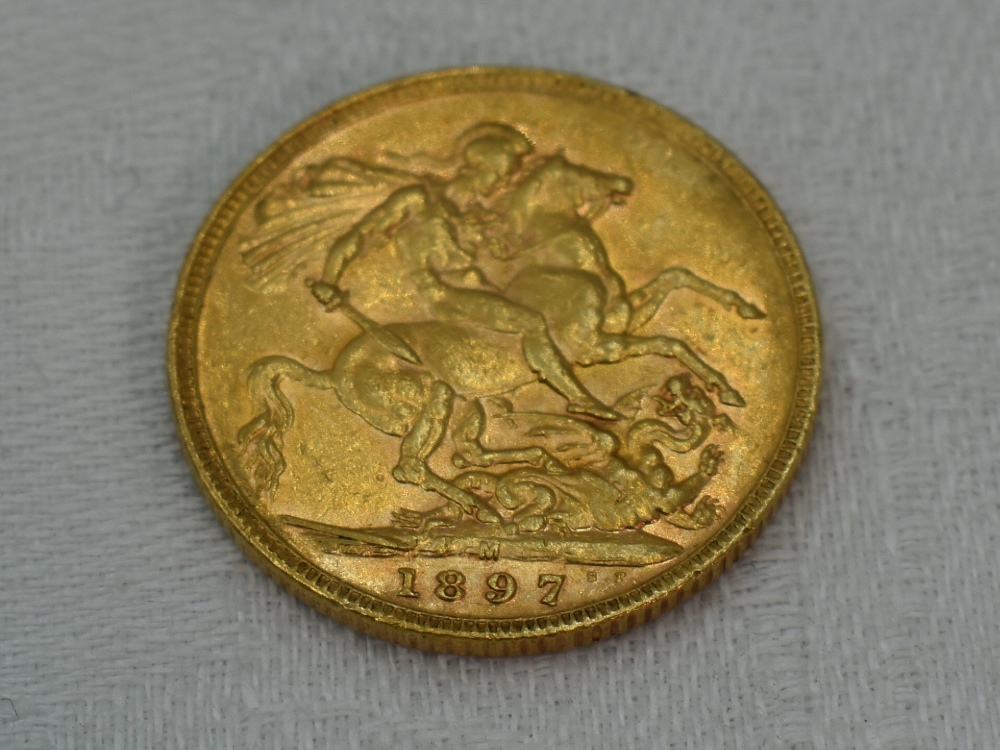 A 1897 Queen Victoria Gold Sovereign in case, Melbourne Mint mark