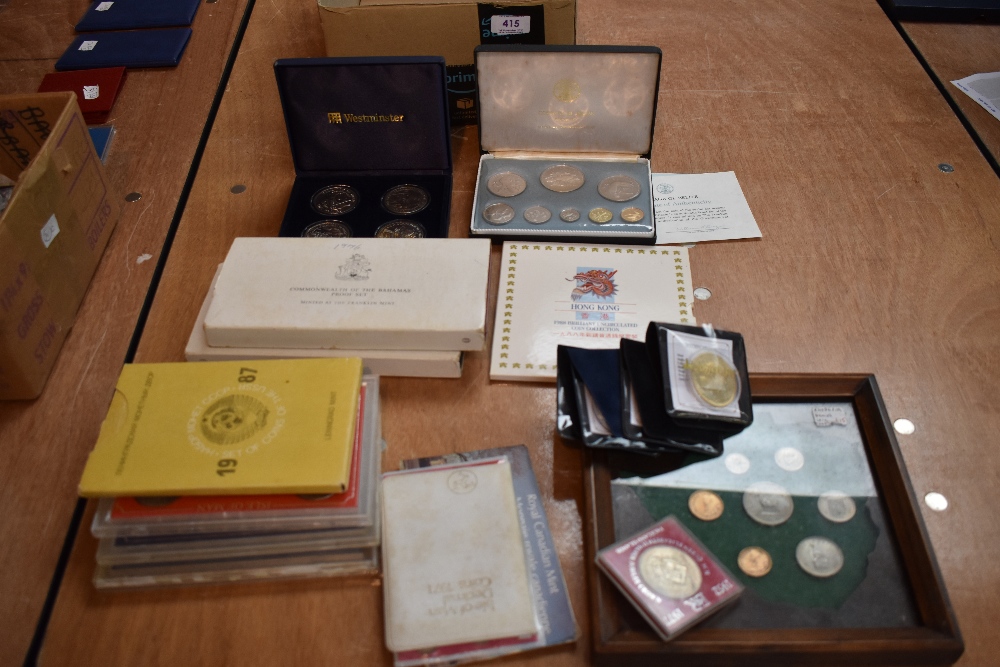 A collection of World Coins including Proof Sets and Silver