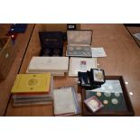 A collection of World Coins including Proof Sets and Silver