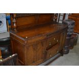 An early 20th Century oak sideboard having ledge back, approx. width 136cm