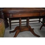 A Regency Rosewood fold over card table