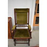 A Victorian stained frame American rocker chair