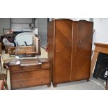 A mid 20th Century oak and ply wardrobe and dressing table