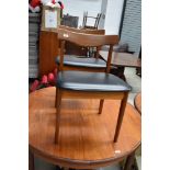 A set of four vintage teak G plan or similar dining chairs