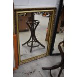 A modern gilt frame wall mirror, approx. 86 x 60cm