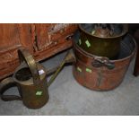 A selection of copper and brassware including kettle and watering can