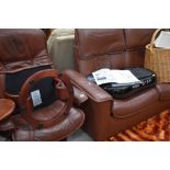 A brown leather three piece stressless suite by Ekornes, settee looks newer than the chairs,