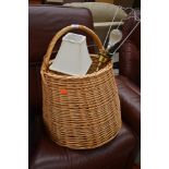 A wicker basket and two table lamps