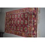 A Turkmen style carpet/rug , approx. 149 x 92cm