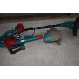 Two electric grass strimmers