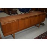 A vintage teak Long John style sideboard, width approx. 198cm