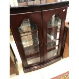 A modern mahogany effect display cabinet, width approx. 46cm