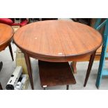 A vintage teak G plan or similar circular extending dining table, diameter approx. 122cm